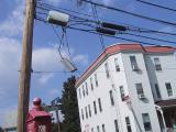 Some cabling hanging from a utility pole