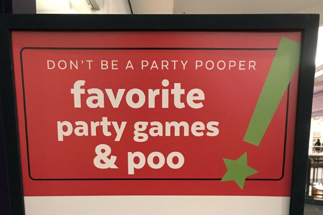 A sign about party games and poo