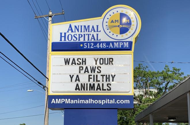 Sign: 'Wash ya paws, ya filthy animals.'